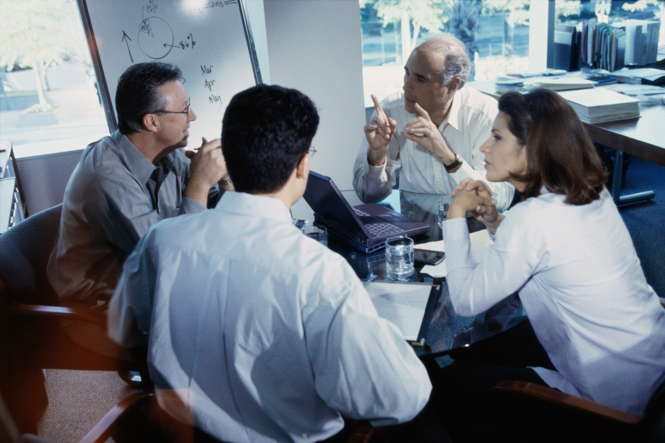 business executives at a round table discussion